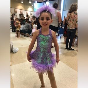 Beautiful lavender sequin and feather detailed dance costume